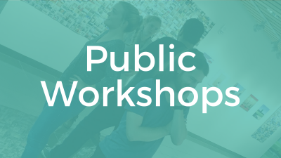 Text: Public Workshops. Image: A group of people standing in a circle, smiling.